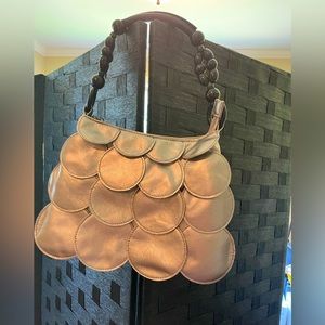 Cute Y2K Silver metallic color shoulder purse with discs attached that move.